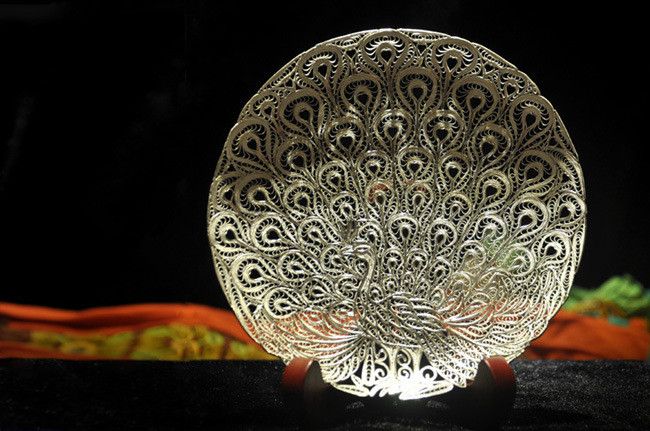 银花丝工艺品银花丝技艺是成都最具特色的传统金银工艺,迄今已有2000